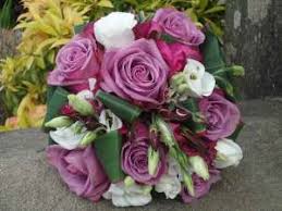 Ladies lapel corsage, made with dried flowers. Wedding Flowers