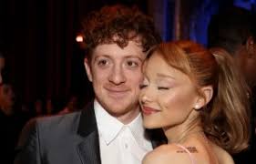 Caprice looks sensational as she flashes her long legs in plunging red mini  dress