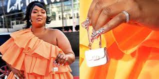 Lizzo's tiny purse is so yesterday: Lizzo Carried The Tiniest Valentino Purse On The Amas Red Carpet