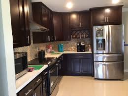 A dish drying cabinet is a piece of kitchen shelving placed above the sink, with an open bottom and shelves made of steel wire or dowels to allow washed dishes set within to drip into the sink and air dry. Water Damage Dry Out And Restoration In Mission Viejo Service First Restoration