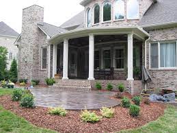 Raised Patio With Covered Porch And Stamped Concrete Signature Building Tn Concrete Patio Designs Patio Outdoor Covered Patio
