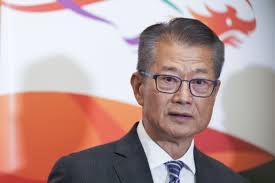 Hong Kong's Paul Chan defends city's currency peg to US dollar in Davos