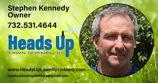 Heads Up Lawn Sprinklers...