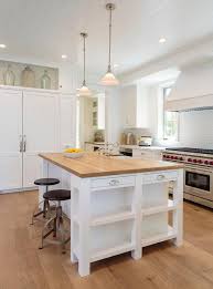 Butcher block islands pair nicely with a variety of kitchen countertops such as granite, marble and quartz, so you can truly personalize your counter space to fit your style. Display Shelf Over Fridge Transitional Kitchen