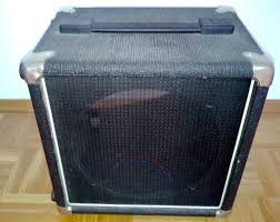 Insert the speaker and run the connectors through their appropriate holes. Empty 10 Speaker Cabinet