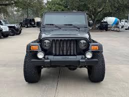 Image result for Brilliant Black 2003 Jeep