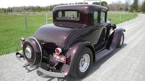 Image result for Rosewood Brown 1930 Pontiac