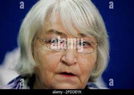 Carol Patton, mother of murdered women Janelle Patton, speaks at a press  conference in Sydney, Australia, Wednesday, Feb. 1, 2006, following the  arrest of a suspect in New Zealand. Janelle's body was found stabbed and  wrapped in black plastic in March ...