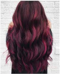 Mulled Wine Hair Is The Latest Winter Hair Color Trend It S Completely Wearable Wine Hair Wine Hair Color Wine Red Hair