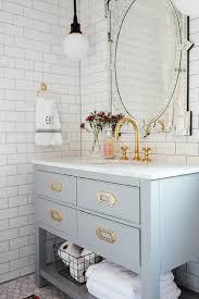 Vanity unit is a piece of bathroom furniture that consists of a washbasin on top and storage cupboards beneath it. Gold Gooseneck Faucet With Light Gray Wood Bath Vanity Transitional Bathroom Benjamin Moore Decorators White