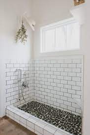 Subway Tile Modern Farmhouse Dog Shower Mudroom Boot Wash Pebble Tile Rock White Walls Shower Remodel Small Shower Remodel Farmhouse Shower