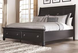 Greensburg Queen Sleigh Bed With Storage Footboard By Ashley Millennium California King Bed Frame King Storage Bed King Bed Frame