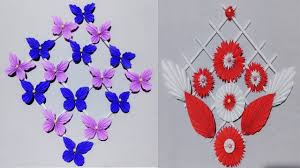 Once all the diy paper flowers are ready, all of them are assembled on a base covered with designer paper to make the most beautiful handmade wall decor, paper flowers wall hanging. 2 Diy Paper Butterfly Wall Hanging Diy Art And Craft Ideas Wall Decor Wall Hanging Crafts Paper Butterfly Wall Hanging Diy