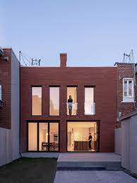 Natalie Dionne Architecture Creates Brick House From Montreal Apartments Brick Facade Brick Architecture Architecture