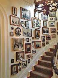 How do you arrange pictures on a staircase wall? How To Decorate A Staircase Wall The Zhush Blog