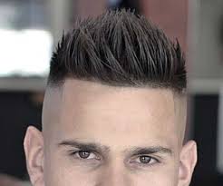 This Is A Look That Will Make You Stand Out From A Crowd For All The Good Reasons It Combines The Youthful Faux Hawk Hairstyles Fohawk Haircut Mens Hairstyles
