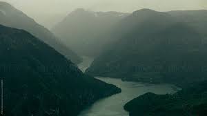 Moody Rainy Mountain Landscape By Marko Stocksy United