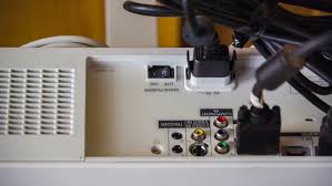 Cords are allowed to connect to a receptacle in a space adjacent to the space occupied by the appliance. so a cord can go through a cabinet compartment (not a wall), but the receptacle must be accessible and located to protect against physical damage to the cord. How To Hide Projector Wires