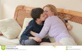 Mom and Son Chatting Heart To Heart on the Wicker Sofa Stock Video - Video  of love, care: 90194563