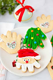 Cookie tutorials and pictures of cute cakes that i like. Fun Christmas Cookies Handprint Sugar Cookies For The Holidays Helloyummy
