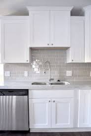When it comes to kitchens, gray kitchen cabinets are the new white! White Or Smoke Grey Subway Tile