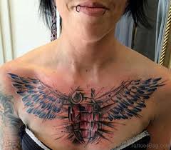 This wing tattoo design on the chest of this man seems to be inspired from the logo of batman especially for the movie poster of the dark knight rises by christopher nolan. 86 Graceful Angel Tattoos For Chest