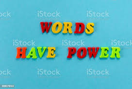 Phrase Words Have Power Of Colored Plastic Magnetic Letters On Blue Paper  Background Stock Photo - Download Image Now - iStock