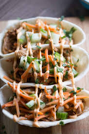I did a similar meal recently with pork shoulder simmered in a red thai curry sauce. Asian Bbq Pork Taco Boats Lemonsforlulu Com