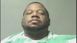 Man arrested after police find narcotics, stolen weapon