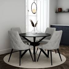 Huge range of dining room chairs for home or trades. Black Round Dining Table With 4 Grey Woven Fabric Dining Chairs Karie Furniture123