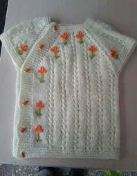 Yakadan Baslama Cicek Islenmis Yandan Dugmeli Yelek Yapimi Orgu Baby Knitting Patterns Bebek Yelek