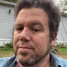 What is the new trash can distribution and pickup schedule in Freeport?