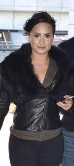 Who Made Demi Lovato S Black Leather Jacket Outfitid Leather Jacket Black Leather Jacket Star Fashion
