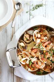 I leave the shells on the shrimp during the cooking process because that's where a lot of the flavor comes from. Sea Island Seafood Stew From Skull Creek Boathouse A Hilton Head Vacation Seafood Stew Seafood Dinner Seafood Dinner Party