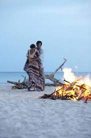 campfire song saa private island luxury beach resorts beach fire
