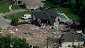 sinkhole swallows homes in florida cnn