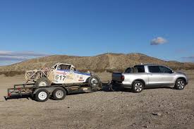 They are light enough to pull behind a car as small as a mini cooper. Towing A Trailer Everything You Need To Know Roadshow