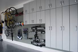 Want to keep your #garage tidy? Garage Organization Ideas Plans Tips Your Go To Guide Flow Wall Garage Storage Systems Garage Storage Solutions Diy Garage Storage