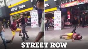 Watch moment porn star King Midas brawls in street as girlfriend holds  him back after shopper shouts get a real job | The US Sun