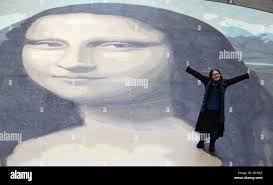 Artist Katy Webster stands