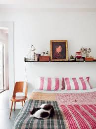 A medium sized bed, placed in the center of the room against a back wall creates space on both sides for bedside table storage. 60 Ideas For Filling The Empty Space Above Your Bed House Interior Shelf Decor Bedroom Bedroom Interior
