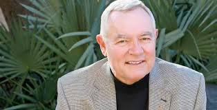 DR. STAN CARPENTER Love of education kept alumnus forever in college