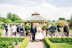 Newly Married Couple At Secret Garden In Kent Wedding Venue Kent Wedding Venues Secret Garden Kent Wedding