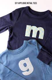 I have used iron on letters many times and they are extraordinary. Diy Applique Initial T Shirt Tee Shirts Diy Diy Applique Recycled T Shirts