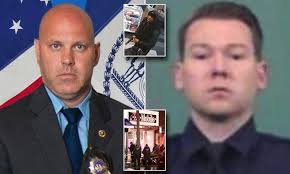 NYPD detective shot dead and sergeant injured in shootout with armed robber  at Queens T-Mobile store