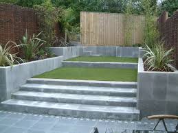 Modern Split Levelled Entertaining Area Olive Garden Design And Landscaping Modern Landscaping Sloped Garden Garden Design