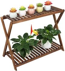 It can hold three planters and you can make it using the ikea ps plant stand, three wood plates, some glue, and clamps. Wood Plant Stand Indoor 3 Tier Tall Plant Shelf Flower Pot Stands Disp East The Wood Art