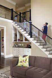 Love This Open Floorplan Efficient Use Of Space Under Stairwell Storage And Pretty Colorin Under Stairs Storage Solutions Bar Under Stairs Staircase Storage