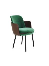 The classic club chair updated with a tapered silhouette floating on a round wooden base. Merwyn Chair Wittmann