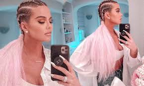 Khloe kardashian sparked cries of cultural appropriation with her new bantu knot hairstyle, as seen in a tuesday, august 9, instagram post khloe kardashian sparks outrage with bantu knot hairstyle. Khloe Kardashian Continues To Model Her New Cornrow Braids With Wild Pink Pigtail Extensions Daily Mail Online